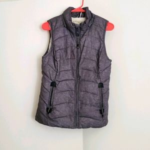 Small grey puffer vest from green tea.